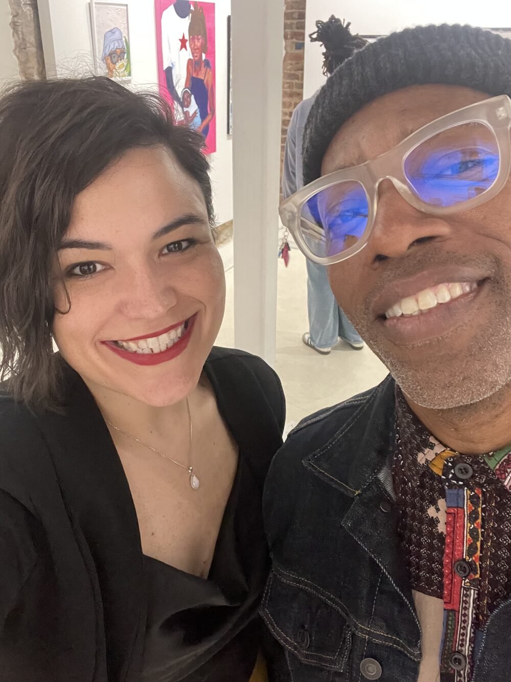 Amber Guinn and Tee Roy together at a gallery, the two artists behind Sticky Note Collab